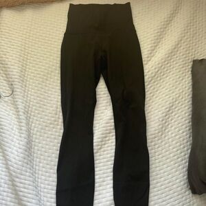 Lululemon black leggings with mesh along the sides